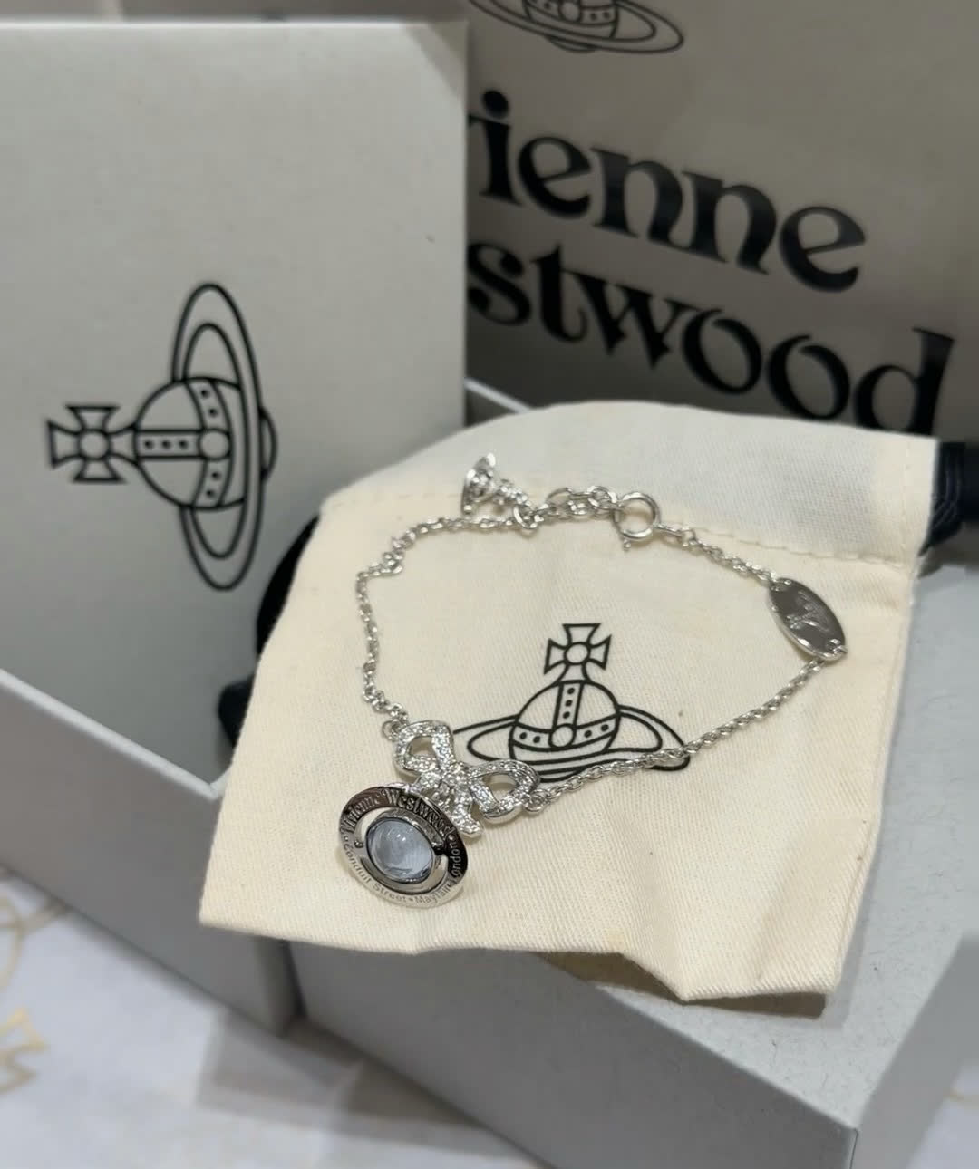 Vivienne Westwood Silver Bracelet with Blue Stone and Bow